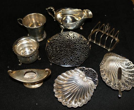 Silver sauceboat, 2 x shell butter bowls, pierced silver stand, sugar bowl, mug, toastrack, lamp base and butter knife